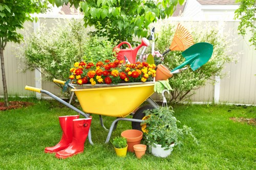 Gardeners working safely in Cubitt Town with protective equipment