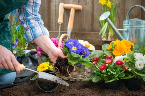Team member using gardening tools with safety checks in place